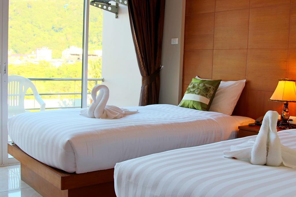 Good Nice Hotel Patong Bagian luar foto