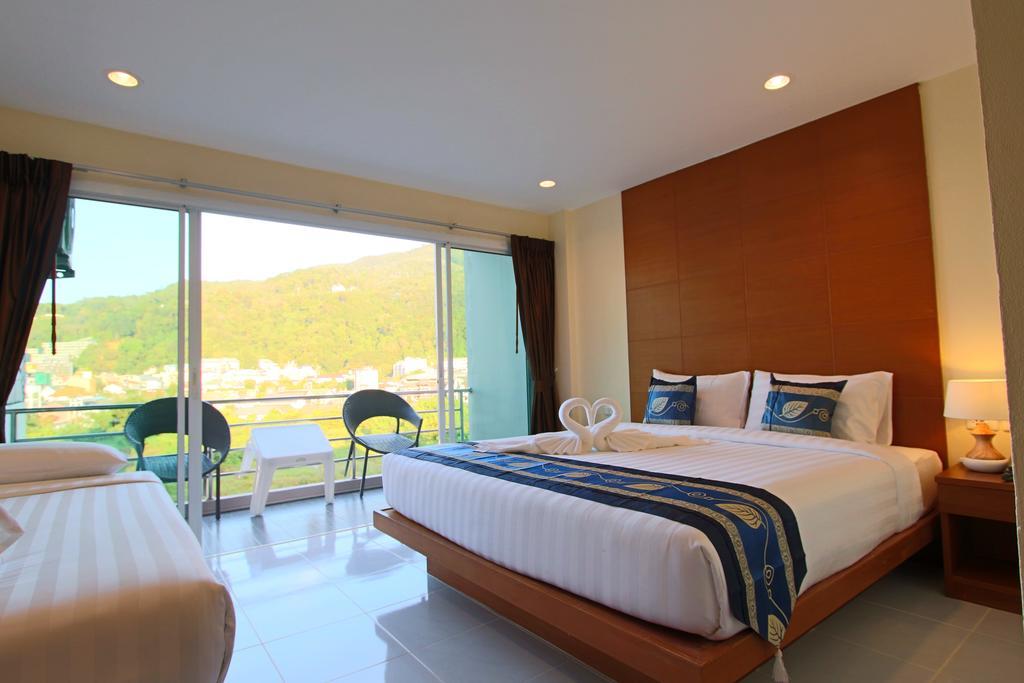 Good Nice Hotel Patong Bagian luar foto